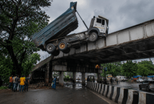 Speeding Dumper Hits Iron Bridge in Vasai; Left Dangling Mid-Air After Hydraulic System Fails!