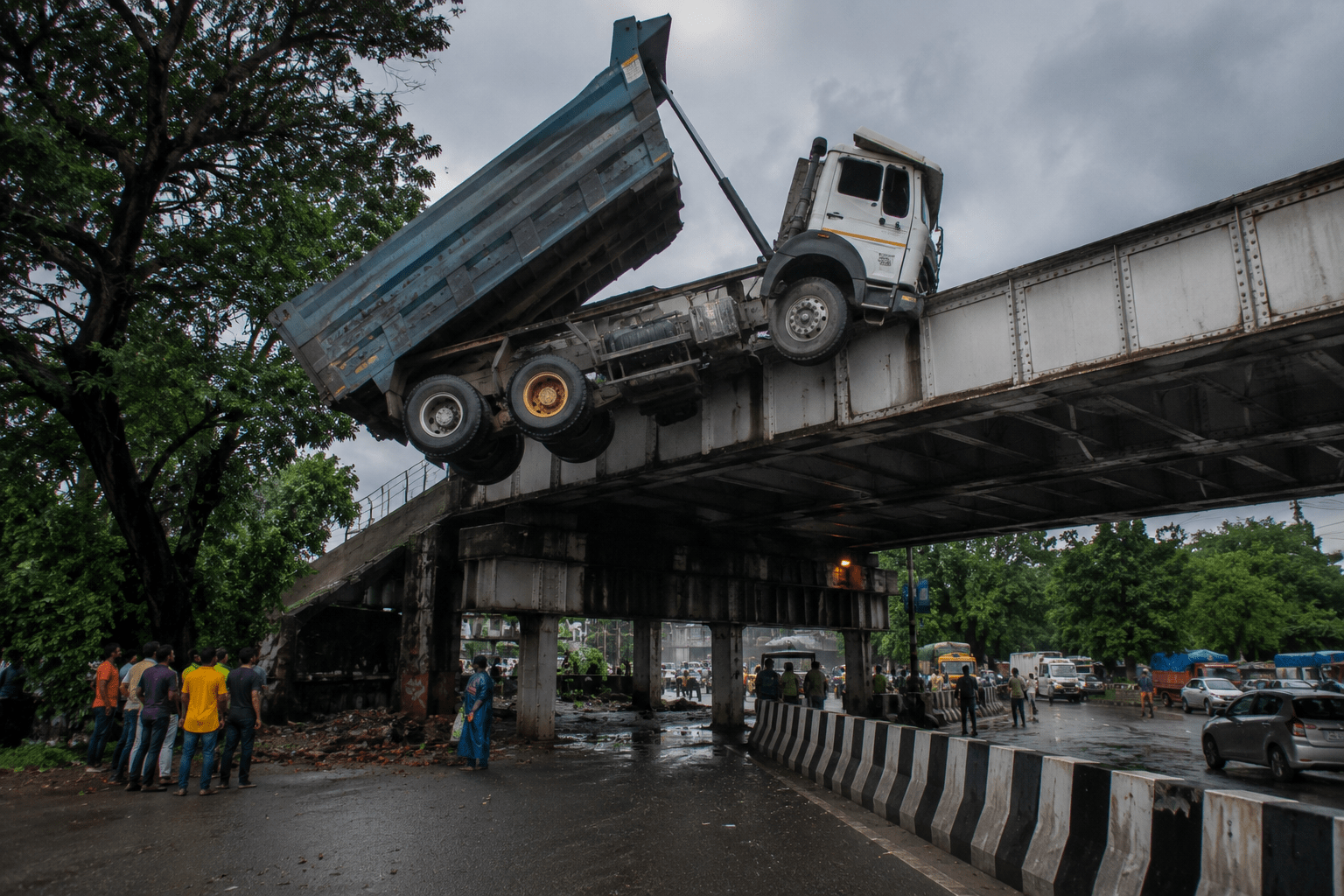 Speeding Dumper Hits Iron Bridge in Vasai; Left Dangling Mid-Air After Hydraulic System Fails!