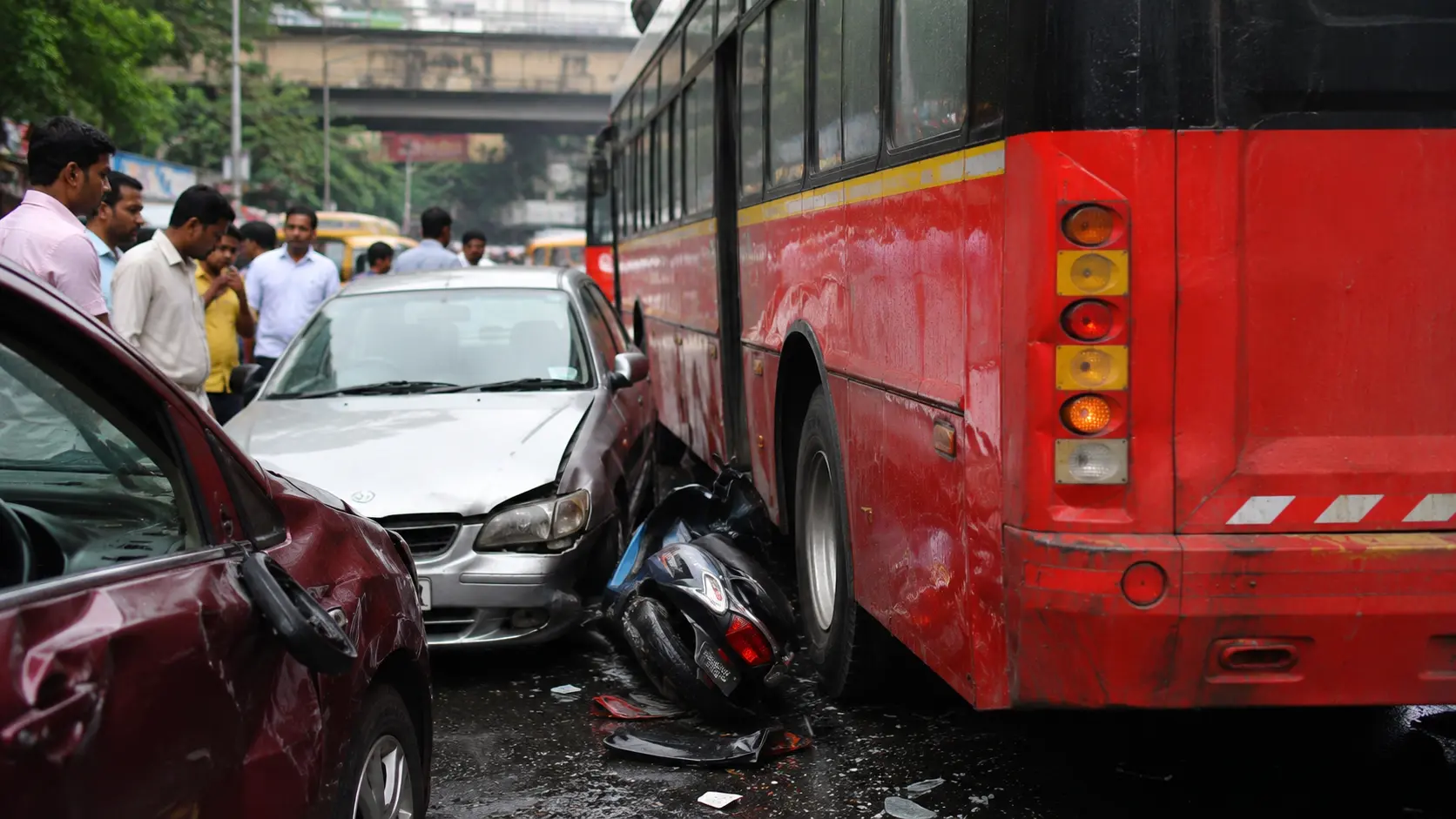BEST Bus Reverses and Hits Pedestrian, Multiple Vehicles Damaged – Watch Viral Video