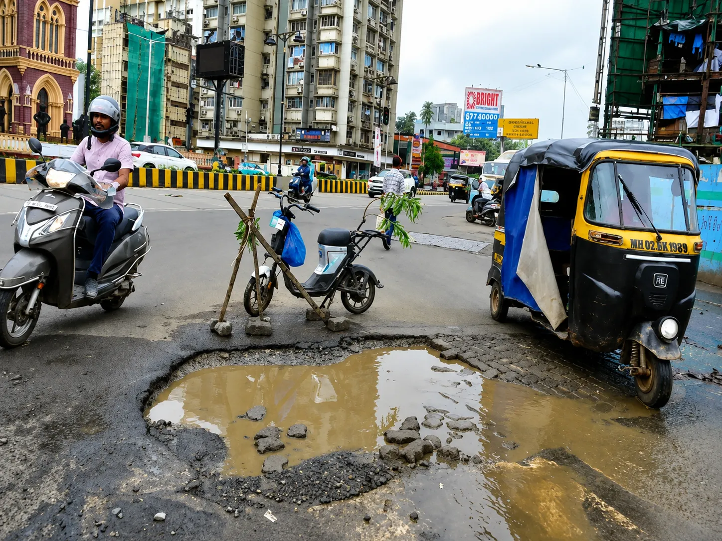 Commuter Nightmare: Deep Potholes Outside Bandra West Station Pose